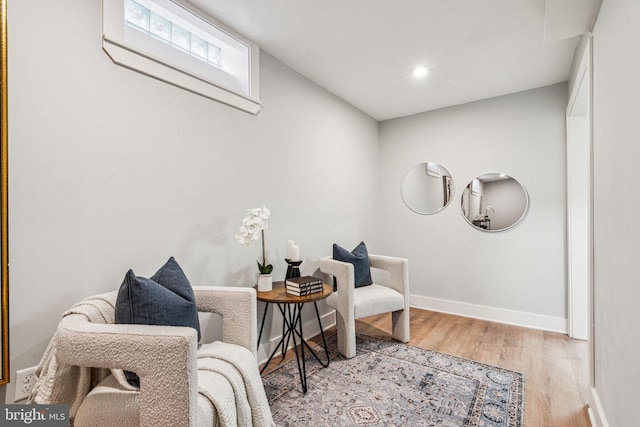 sitting room featuring light wood-type flooring
