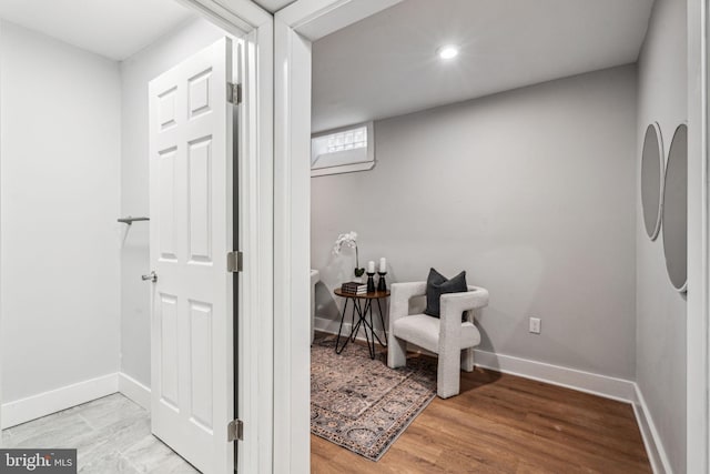 living area featuring hardwood / wood-style flooring