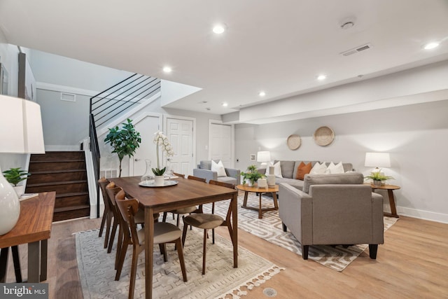 dining room featuring light hardwood / wood-style floors