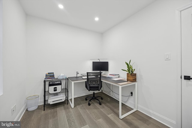 office area with recessed lighting, wood finished floors, and baseboards