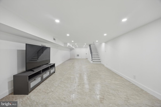 unfurnished living room with marble finish floor, baseboards, stairway, and recessed lighting