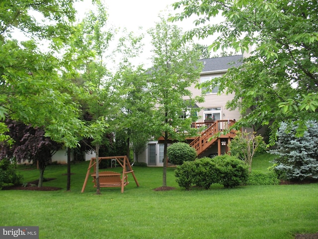 view of yard featuring a wooden deck