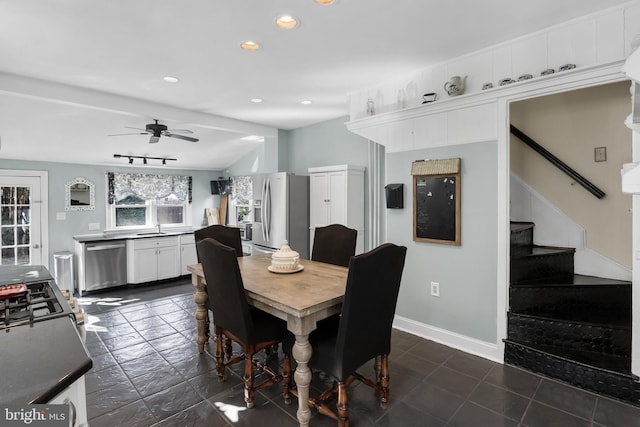 dining area featuring recessed lighting, lofted ceiling, ceiling fan, baseboards, and stairs