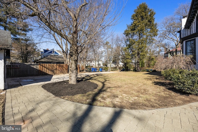 view of yard featuring fence