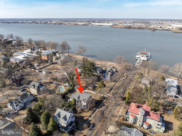 aerial view featuring a water view and a residential view