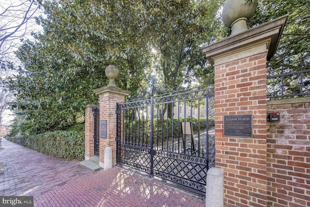 view of gate featuring fence