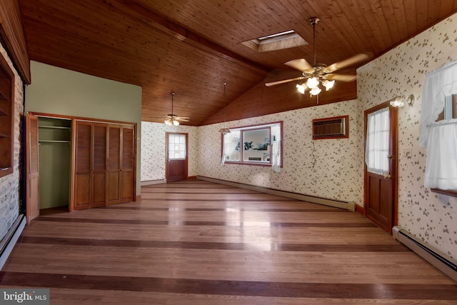 unfurnished bedroom with wood ceiling, a wall mounted air conditioner, a baseboard radiator, vaulted ceiling with skylight, and hardwood / wood-style floors