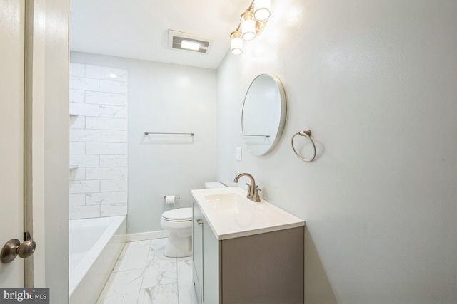 full bathroom featuring tiled shower / bath combo, vanity, and toilet