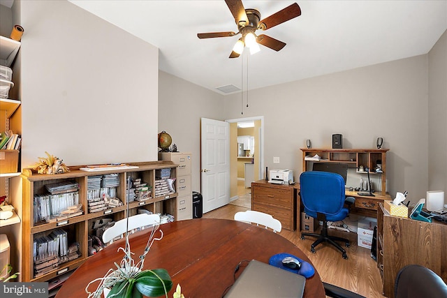 office area featuring ceiling fan and light hardwood / wood-style floors