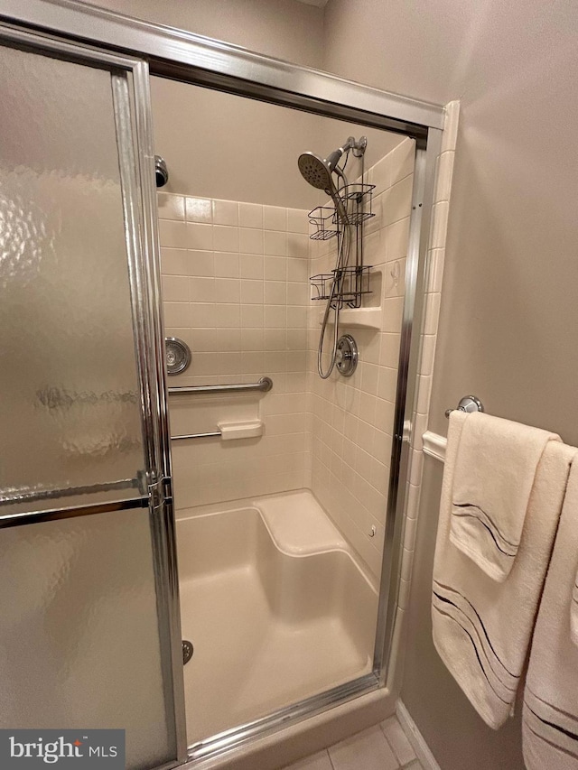 full bathroom with a stall shower