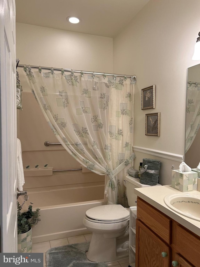 bathroom with tile patterned flooring, toilet, recessed lighting, vanity, and shower / bath combo with shower curtain