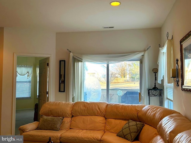 living room with a wealth of natural light and visible vents