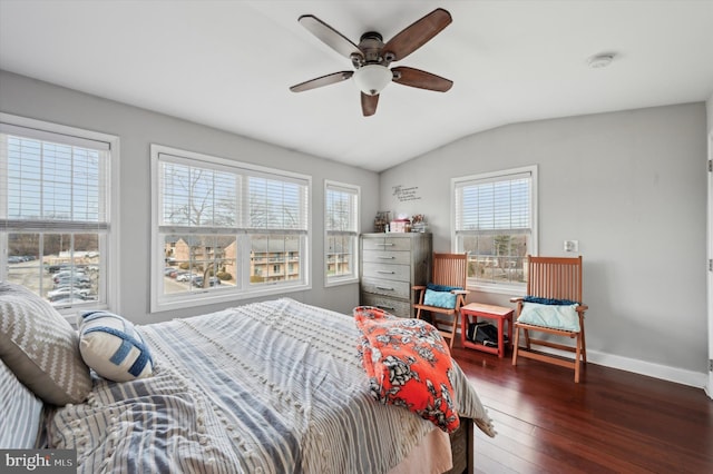 bedroom featuring lofted ceiling, dark wood-type flooring, and ceiling fan