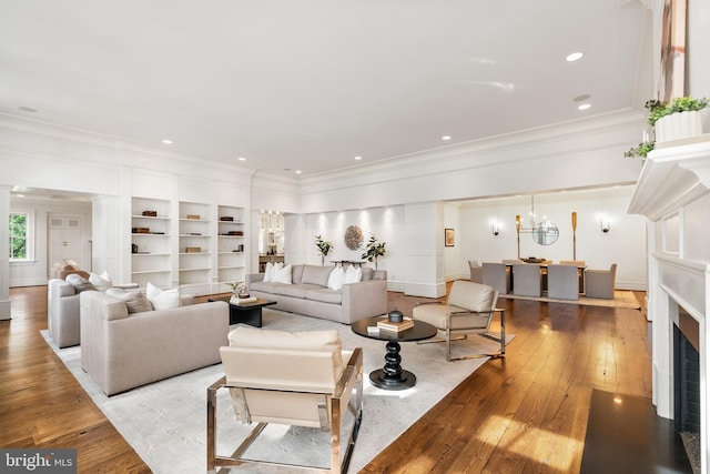 948 Melvin Rd, Annapolis, MD 21403 - living area featuring crown molding, hardwood / wood-style flooring, a fireplace, and baseboards