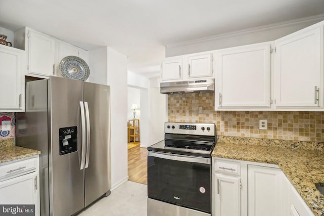 kitchen with white cabinetry, backsplash, light stone countertops, and appliances with stainless steel finishes