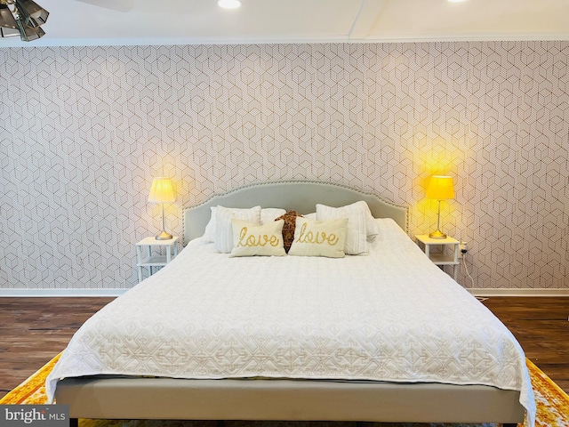 bedroom featuring dark hardwood / wood-style flooring