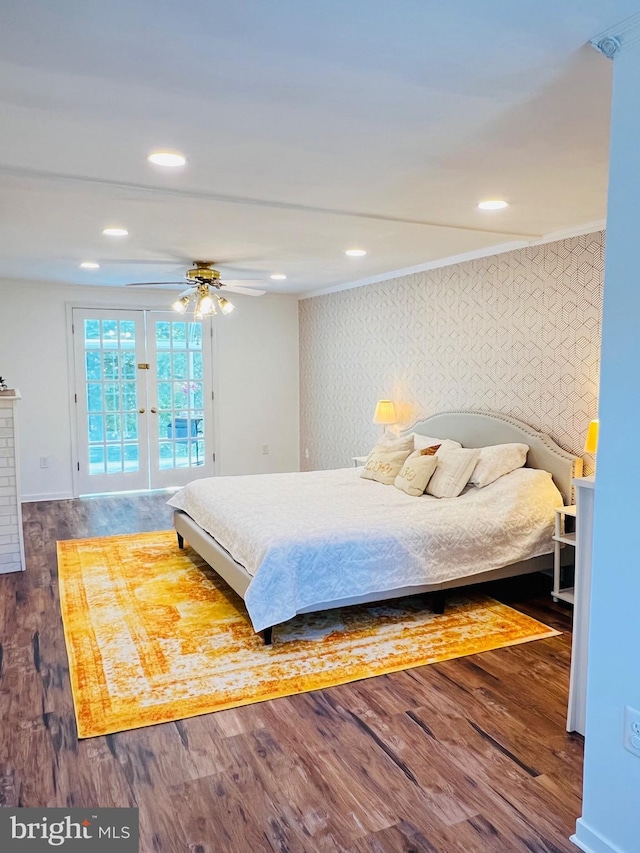 bedroom featuring crown molding, dark hardwood / wood-style floors, access to outside, and ceiling fan