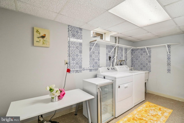 washroom featuring washer and dryer