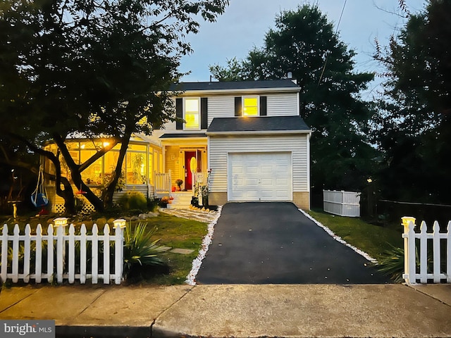 view of front property with a garage