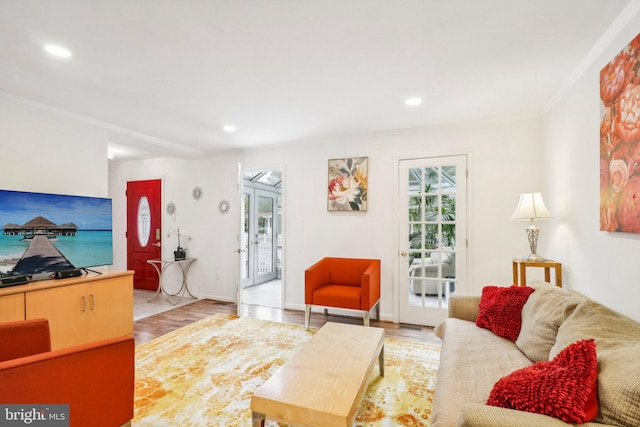 living room with light hardwood / wood-style floors and french doors