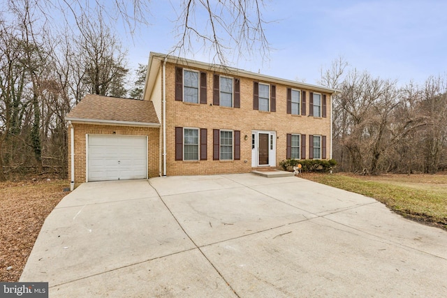 colonial home featuring a garage