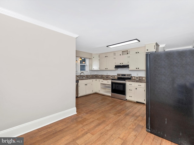 kitchen featuring sink, crown molding, white cabinetry, light hardwood / wood-style flooring, and appliances with stainless steel finishes