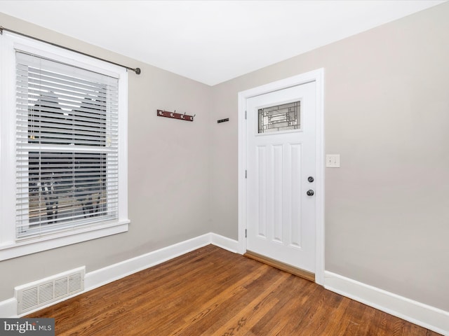 foyer entrance with wood-type flooring