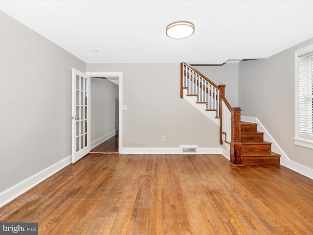 interior space with hardwood / wood-style floors