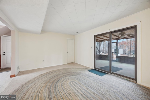 spare room with light colored carpet