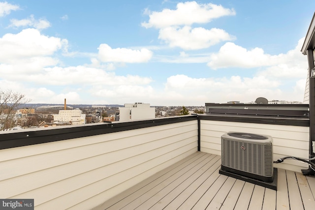 wooden deck with central AC unit