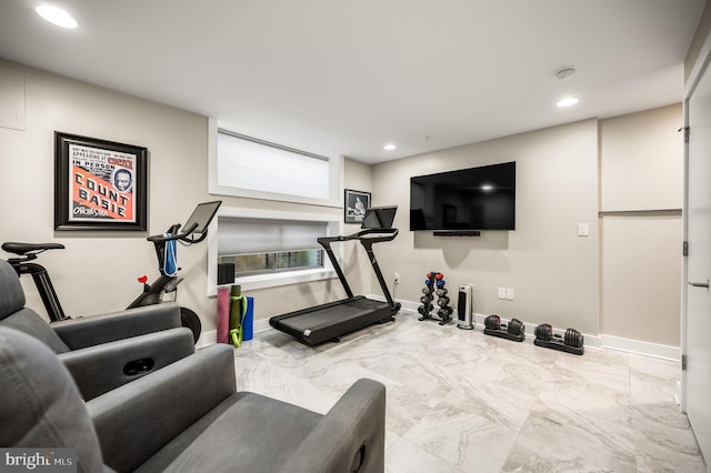 exercise area with marble finish floor, baseboards, and recessed lighting