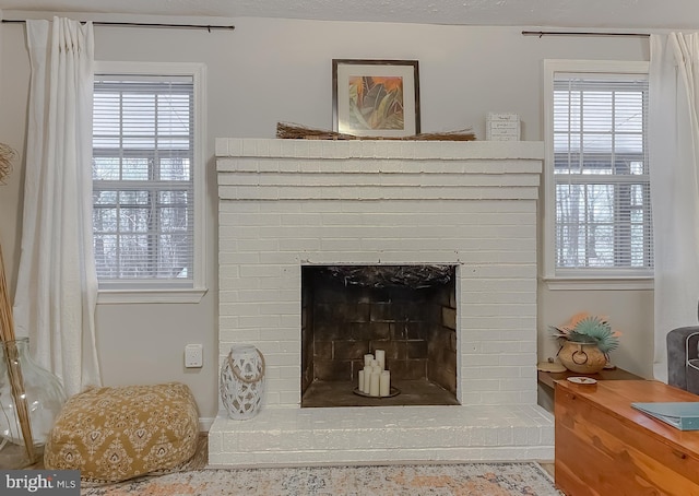 details featuring a brick fireplace