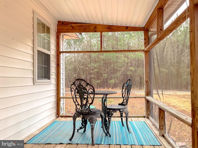 sunroom / solarium with wood ceiling