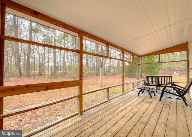 sunroom / solarium with vaulted ceiling