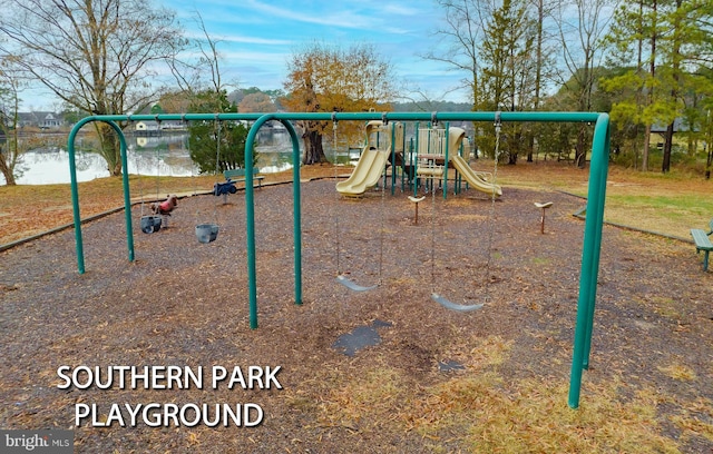 view of play area with a water view