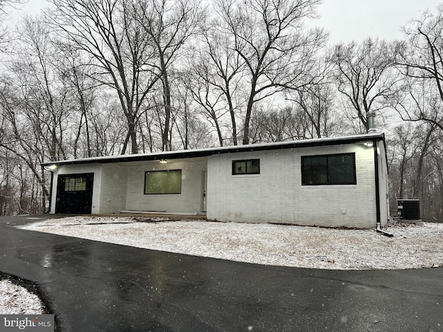 view of front of home with central air condition unit