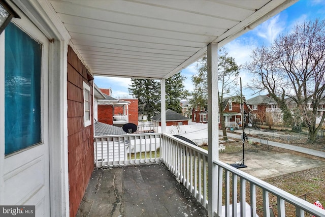 balcony featuring a porch