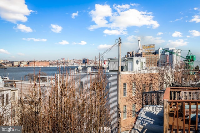 property's view of city with a water view