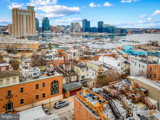 property's view of city featuring a water view