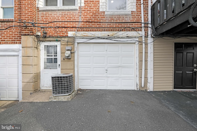 garage with central AC unit