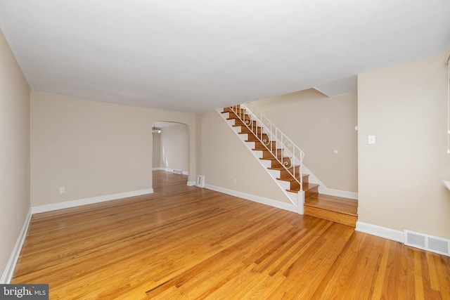 empty room featuring wood-type flooring