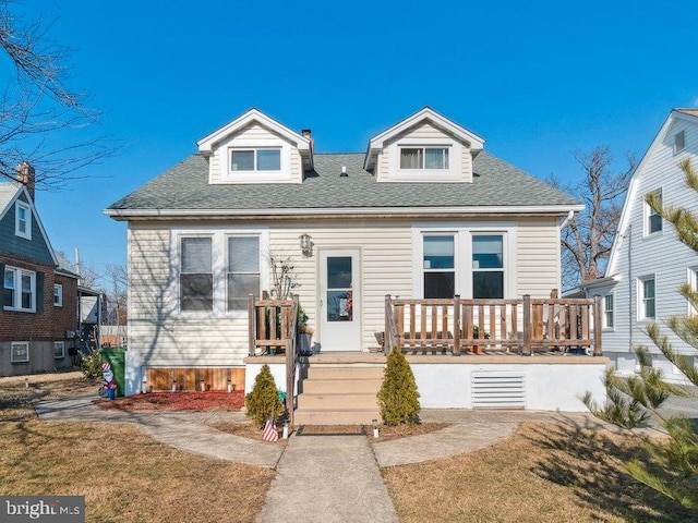 view of front of home with a front yard