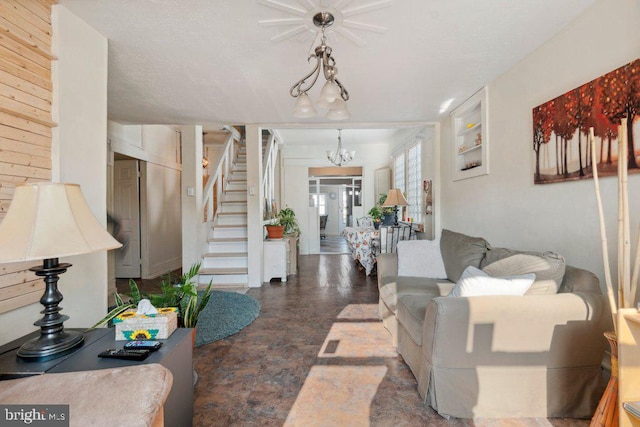 living room with a notable chandelier