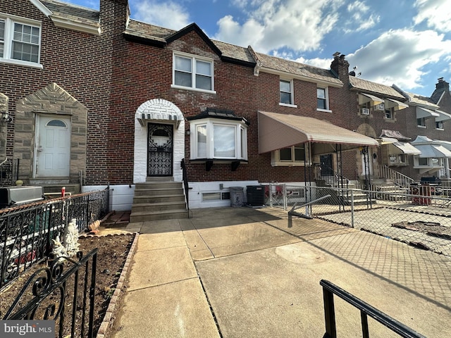 townhome / multi-family property with central AC