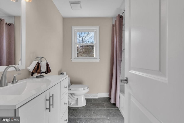 full bathroom with visible vents, vanity, toilet, and baseboards