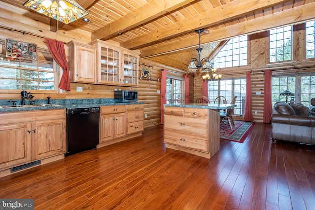 kitchen featuring dishwasher, stainless steel microwave, wooden ceiling, and light brown cabinetry