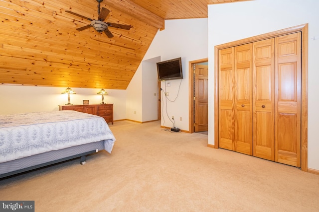 bedroom featuring light colored carpet, wood ceiling, baseboards, and vaulted ceiling