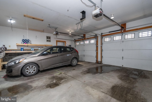 garage featuring a garage door opener