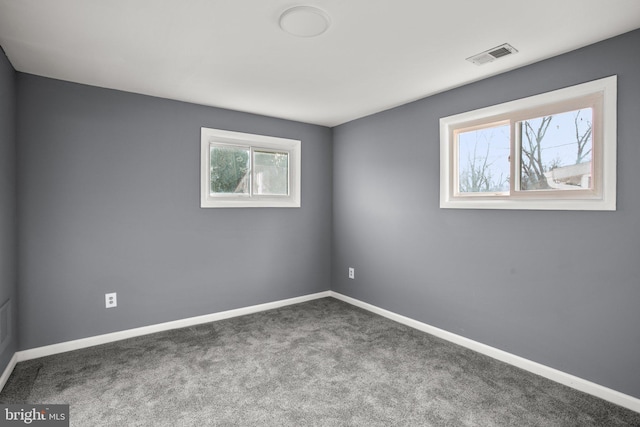 unfurnished room featuring carpet flooring