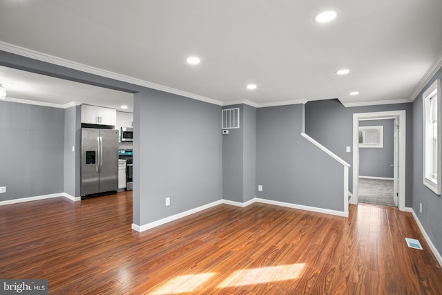 interior space featuring stainless steel refrigerator with ice dispenser, ornamental molding, and wood-type flooring